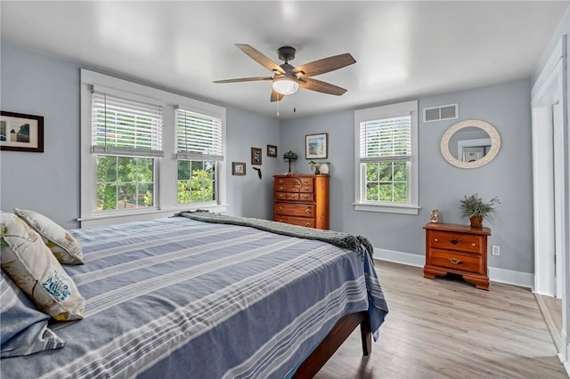 401 Stanford Ave, Ross Twp, PA 15229 - bedroom featuring wood finished floors and a ceiling fan