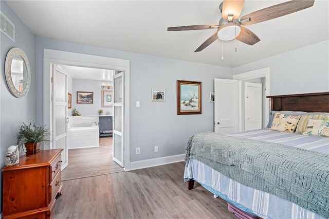 401 Stanford Ave, Ross Twp, PA 15229 - bedroom featuring wood finished floors, ensuite bath, ceiling fan, and a chandelier