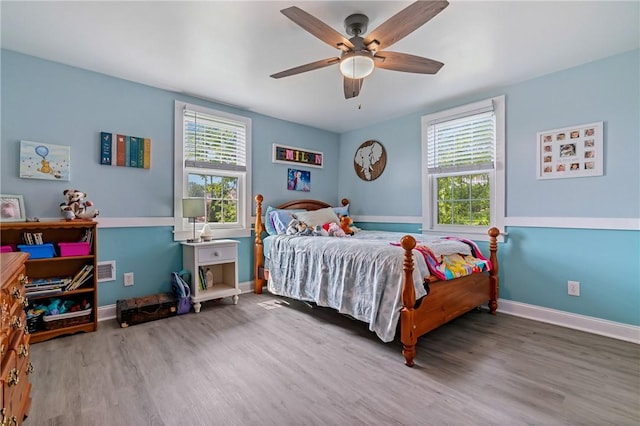 401 Stanford Ave, Ross Twp, PA 15229 - bedroom featuring wood finished floors and ceiling fan