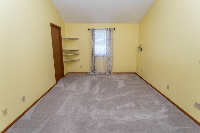 408 Victor Dr, South Union Twp, PA 15401 - empty room featuring carpet flooring and lofted ceiling