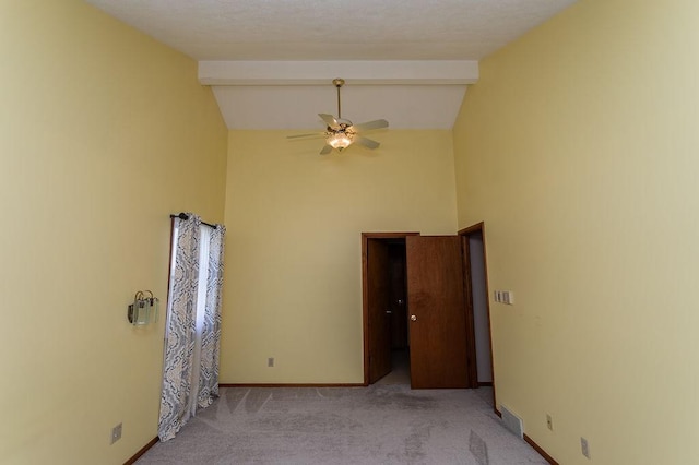 408 Victor Dr, South Union Twp, PA 15401 - carpeted spare room featuring a ceiling fan, beam ceiling, and high vaulted ceiling