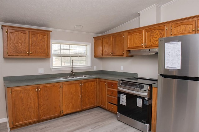 824 Emerson Ave, Farrell, PA 16121 - kitchen with stainless steel appliances, under cabinet range hood, crown molding, light wood-style floors, and brown cabinets