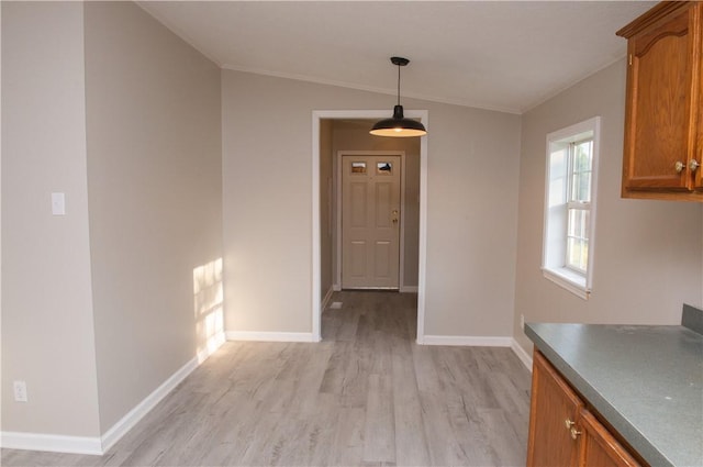 824 Emerson Ave, Farrell, PA 16121 - unfurnished dining area featuring light wood-type flooring and ornamental molding
