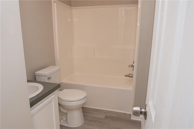824 Emerson Ave, Farrell, PA 16121 - bathroom featuring vanity, wood finished floors, and tub / shower combination