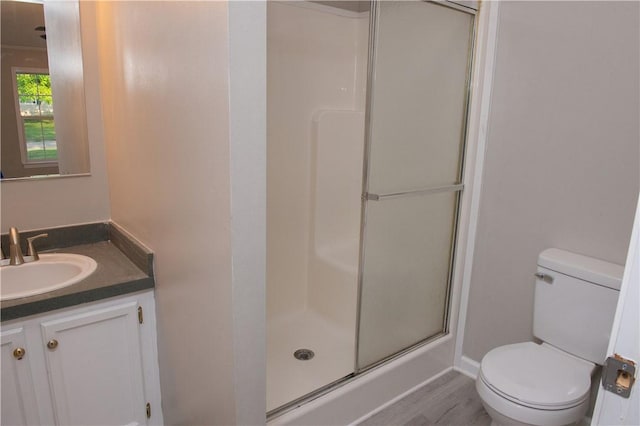 824 Emerson Ave, Farrell, PA 16121 - bathroom with a stall shower, vanity, and wood finished floors