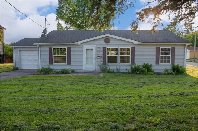 824 Emerson Ave, Farrell, PA 16121 - ranch-style home featuring asphalt driveway, a front yard, and a garage