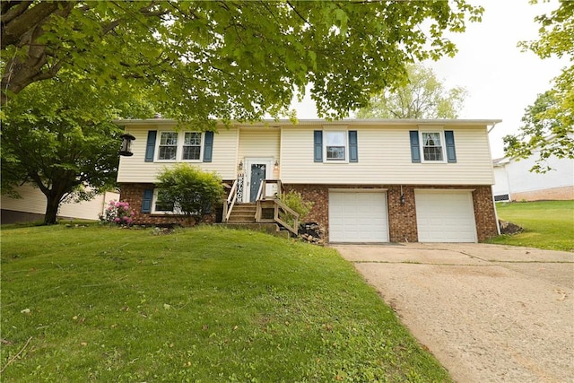 248 Laddie Dr, Canton Twp, PA 15301 - raised ranch featuring a garage, brick siding, concrete driveway, and a front lawn