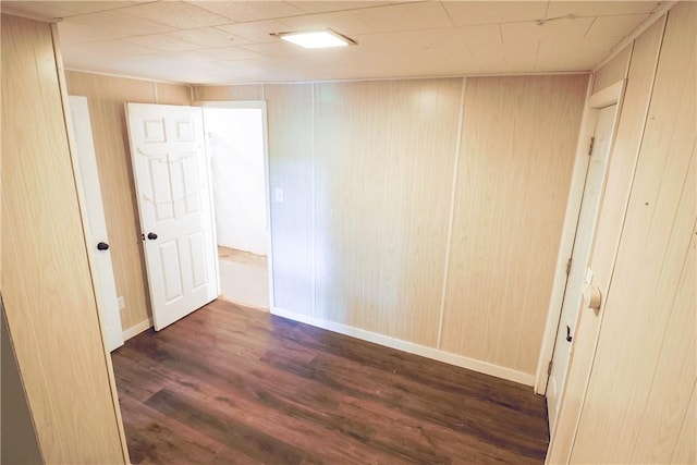 248 Laddie Dr, Canton Twp, PA 15301 - spare room with dark wood-style floors and wooden walls