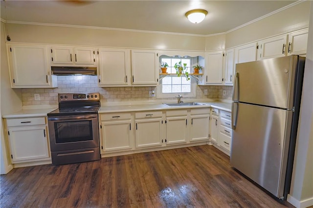 248 Laddie Dr, Canton Twp, PA 15301 - kitchen featuring stainless steel appliances, white cabinetry, under cabinet range hood, light countertops, and dark wood-style floors