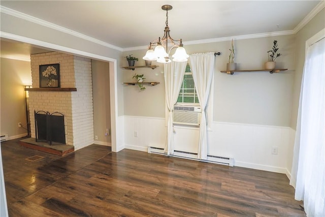 248 Laddie Dr, Canton Twp, PA 15301 - unfurnished dining area featuring a baseboard heating unit, a chandelier, wood finished floors, ornamental molding, and a wainscoted wall