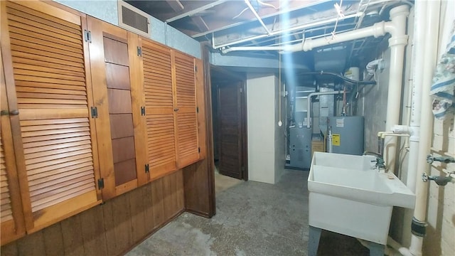 93 8th Ave, Ross Twp, PA 15229 - basement featuring water heater and a sink