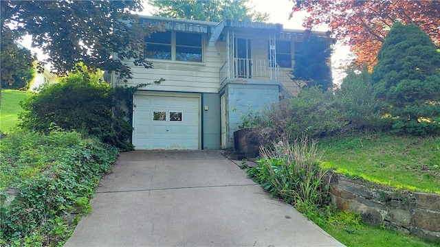 93 8th Ave, Ross Twp, PA 15229 - view of front of home featuring an attached garage and driveway