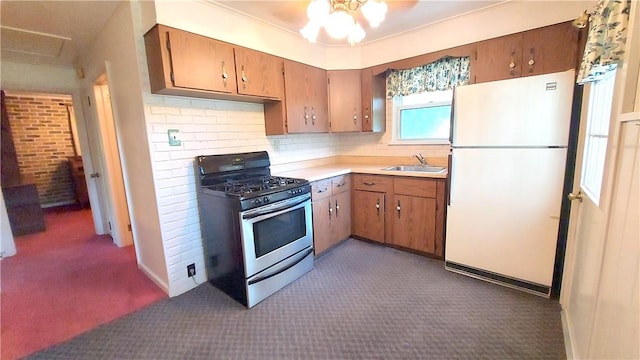 93 8th Ave, Ross Twp, PA 15229 - kitchen featuring freestanding refrigerator, gas stove, dark colored carpet, and brown cabinets