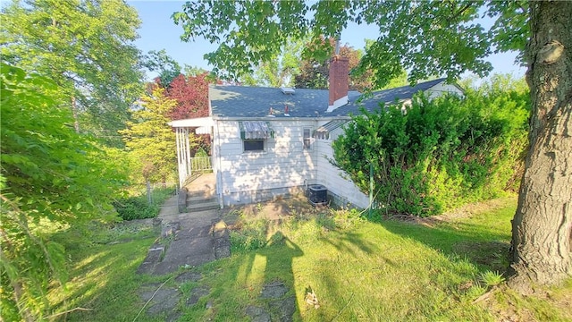93 8th Ave, Ross Twp, PA 15229 - rear view of house with a chimney