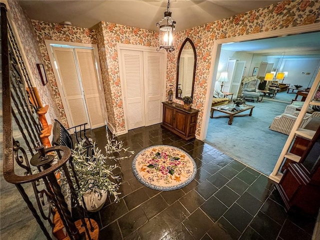 123 W Muntz Ave, Twp Of But Se, PA 16001 - foyer entrance with wallpapered walls and a chandelier