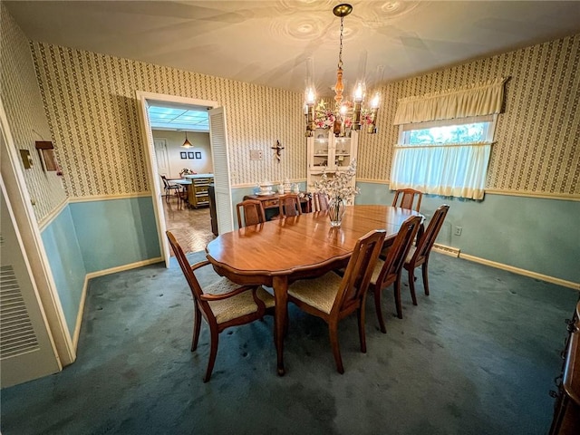 123 W Muntz Ave, Twp Of But Se, PA 16001 - carpeted dining area with wallpapered walls, a chandelier, and a wainscoted wall