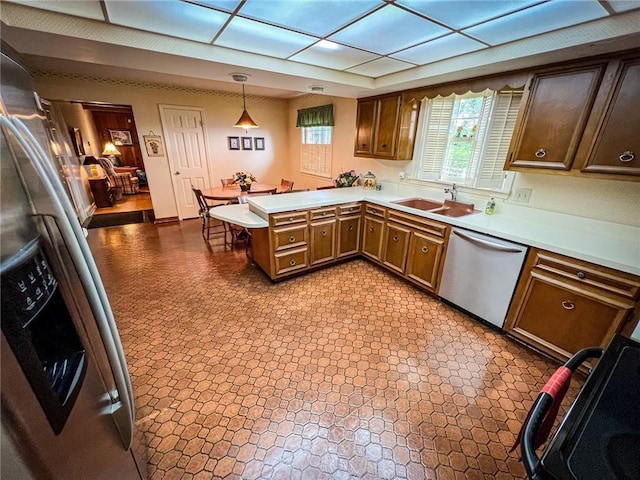 123 W Muntz Ave, Twp Of But Se, PA 16001 - kitchen featuring stainless steel dishwasher, a peninsula, light countertops, and pendant lighting
