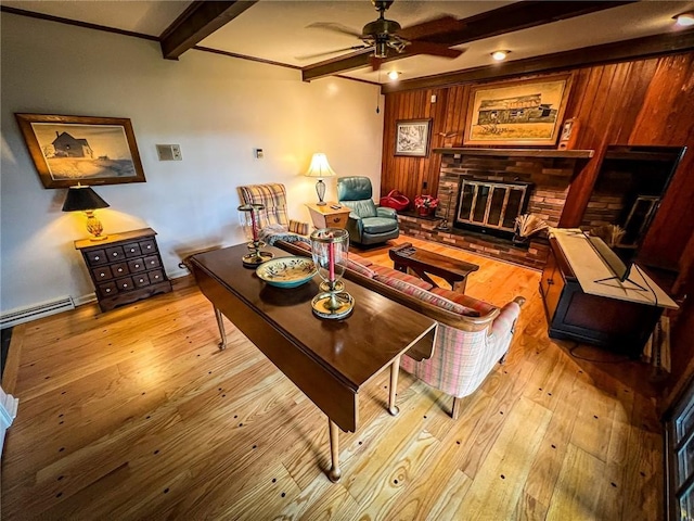 123 W Muntz Ave, Twp Of But Se, PA 16001 - living room featuring beam ceiling, hardwood / wood-style flooring, ceiling fan, a brick fireplace, and baseboard heating