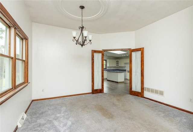 400 Moween Rd, Loyalhanna, PA 15681 - carpeted empty room with a chandelier and baseboards
