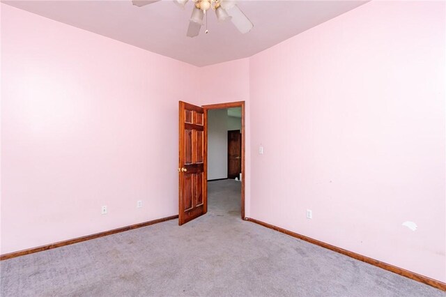 400 Moween Rd, Loyalhanna, PA 15681 - spare room featuring a ceiling fan and light carpet