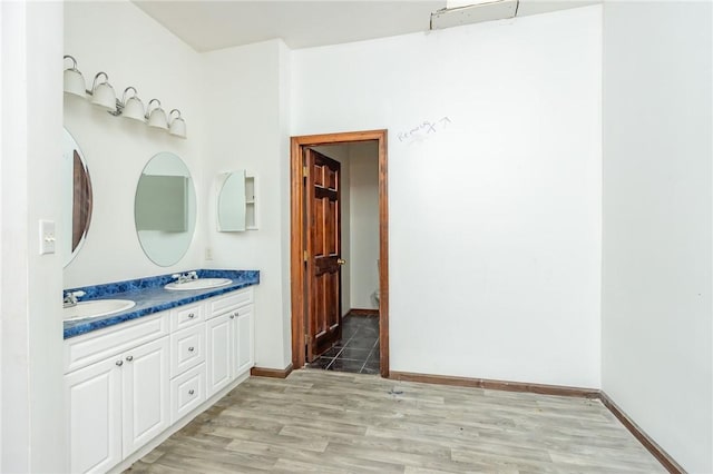 400 Moween Rd, Loyalhanna, PA 15681 - full bath featuring double vanity and wood finished floors