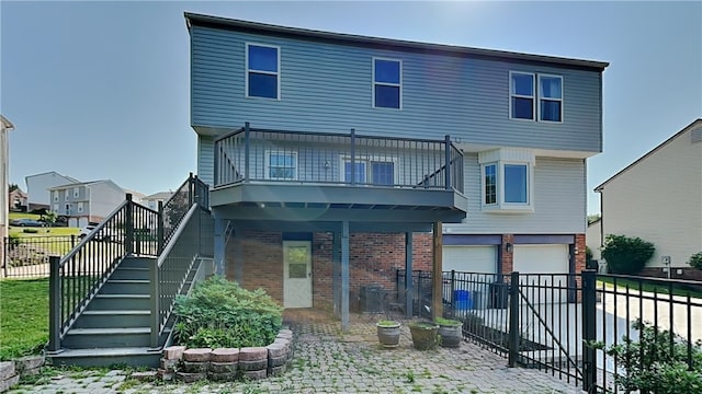 3011 Meyeridge Rd, Shaler, PA 15209 - back of house with stairs, brick siding, an attached garage, and driveway