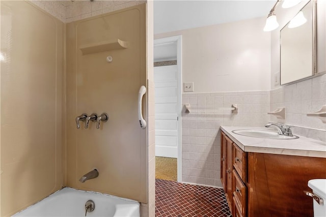 11 Old Mill Rd, Wharton Twp, PA 15470 - full bathroom with vanity, tub / shower combination, tile walls, tile patterned floors, and a wainscoted wall