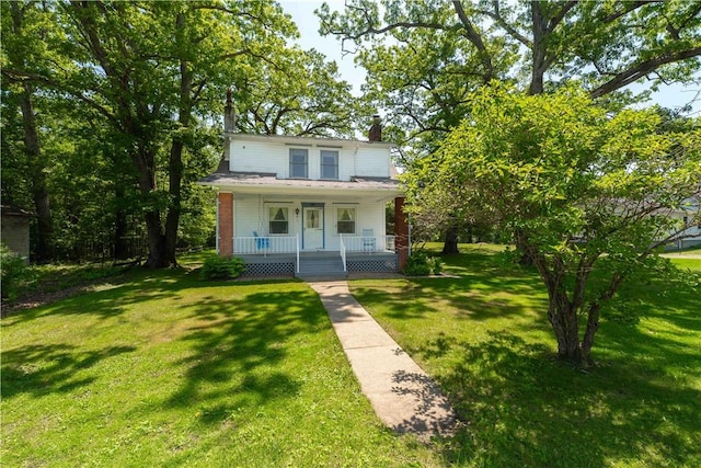 11 Old Mill Rd, Wharton Twp, PA 15470 - view of front of property with a porch, a front lawn, and a chimney