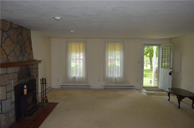 3244 Maple Ln, Jamestown Cra, PA 16134 - unfurnished living room with carpet flooring, a baseboard heating unit, a baseboard radiator, and a textured ceiling