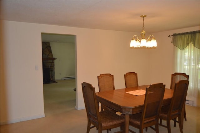 3244 Maple Ln, Jamestown Cra, PA 16134 - dining area featuring a chandelier, light carpet, baseboard heating, a fireplace, and a baseboard radiator