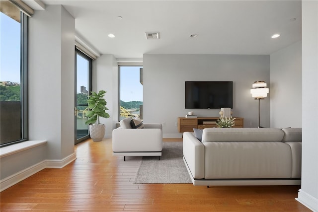 151 Fort Pitt Blvd Unit 1403, Downtown Pgh, PA 15222 - living area with wood finished floors and recessed lighting