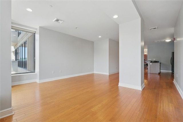 151 Fort Pitt Blvd Unit 1403, Downtown Pgh, PA 15222 - empty room with light wood-style floors and recessed lighting