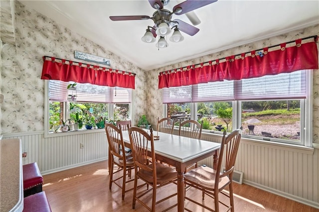 401 Middlesex Rd, Elizabeth Twp/Boro, PA 15135 - dining space featuring vaulted ceiling, wood finished floors, healthy amount of natural light, wallpapered walls, and a ceiling fan