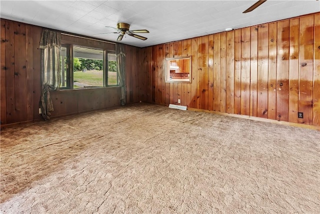 154 Burke Rd, Wharton Twp, PA 15437 - spare room with a ceiling fan and wood walls