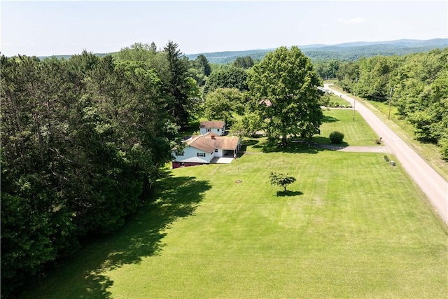 154 Burke Rd, Wharton Twp, PA 15437 - aerial view of property and surrounding area with a heavily wooded area