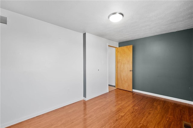 295 Holland Ct, Findlay Twp, PA 15108 - empty room featuring wood finished floors and baseboards