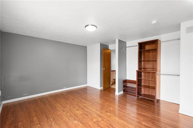 295 Holland Ct, Findlay Twp, PA 15108 - unfurnished bedroom featuring wood finished floors