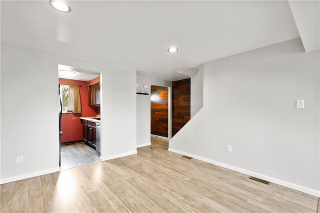 295 Holland Ct, Findlay Twp, PA 15108 - unfurnished living room featuring light wood finished floors and recessed lighting