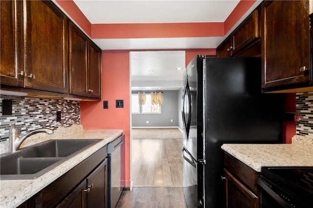 295 Holland Ct, Findlay Twp, PA 15108 - kitchen featuring dark brown cabinetry, light wood finished floors, tasteful backsplash, dishwasher, and recessed lighting