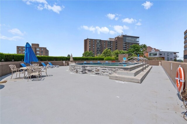1 Trimont Ln Unit 620B, Mt Washington, PA 15211 - surrounding community featuring a patio and a pool
