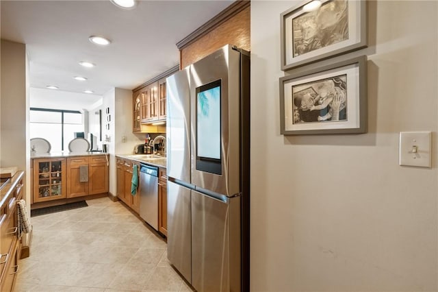 1 Trimont Ln Unit 620B, Mt Washington, PA 15211 - kitchen featuring appliances with stainless steel finishes, glass insert cabinets, brown cabinetry, light countertops, and recessed lighting