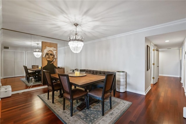 1 Trimont Ln Unit 620B, Mt Washington, PA 15211 - dining area featuring a chandelier, wood finished floors, and ornamental molding
