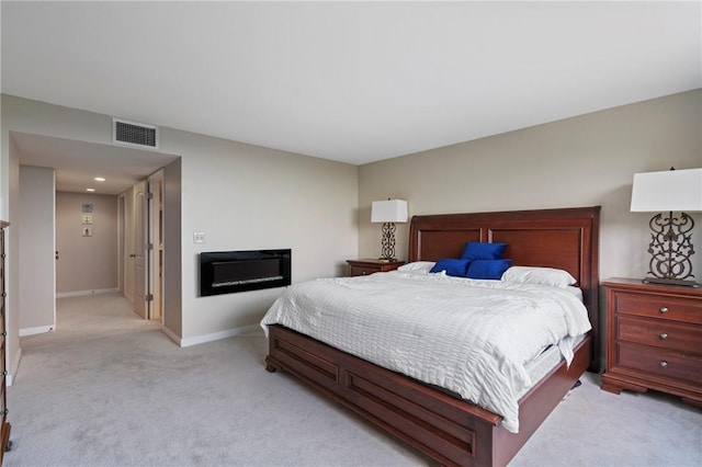 1 Trimont Ln Unit 620B, Mt Washington, PA 15211 - bedroom with light colored carpet and a glass covered fireplace