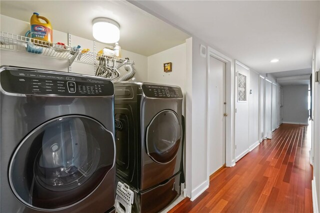 1 Trimont Ln Unit 620B, Mt Washington, PA 15211 - laundry area with washer and dryer, wood finished floors, and recessed lighting