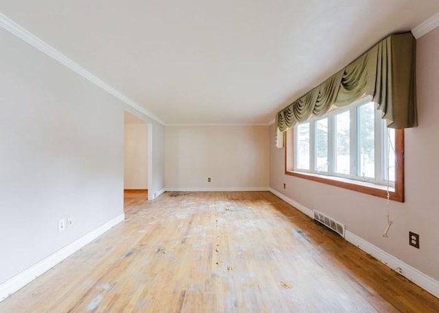 155 Greylock Dr, Penn Hills, PA 15235 - empty room with light wood finished floors and ornamental molding