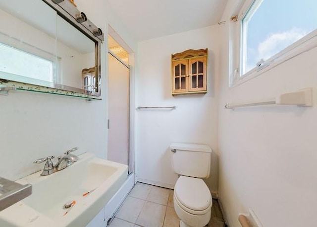 155 Greylock Dr, Penn Hills, PA 15235 - full bath with healthy amount of natural light, tile patterned floors, and an enclosed shower
