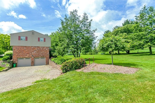 4032 Sardis Rd, Murrysville, PA 15668 - view of grassy yard featuring gravel driveway and an attached garage