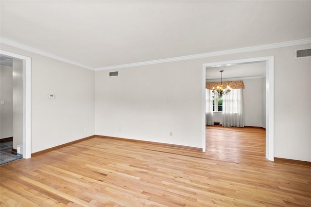 4032 Sardis Rd, Murrysville, PA 15668 - empty room with light wood-style floors, a chandelier, and crown molding