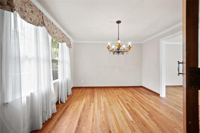 4032 Sardis Rd, Murrysville, PA 15668 - empty room featuring a chandelier, light wood-style flooring, and crown molding