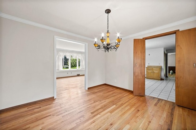 4032 Sardis Rd, Murrysville, PA 15668 - spare room featuring a chandelier, crown molding, and light wood-style flooring